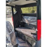 Pushpak 8000 spacious and comfortable back seat for passengers.