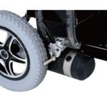 Close-up view of the rear tire on the Merits Travel Ease P183, highlighting the tread design and durability