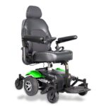 Merits Vision Sport wheelchair in green, front side view, showcasing its sleek design and comfortable seat