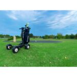 Quarter back view of the Golf Skate Caddy GSC™ Tourer X Golf Cart Mobility Scooter positioned in front of a scenic water lake on the golf course, showcasing its design and suitability for leisurely rounds of golf.