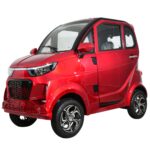 Vibrant red Green Transporter Q Express showcasing a futuristic design with clear windows, alloy wheels, and high visibility, promoting sustainable urban transport.