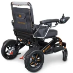 Rear quarter view right of Bangeran Mamooth wheelchair showing joystick side armrest and wheels.