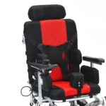 Close up of seat and joystick on Bangeran Pegasus Cerebral Palsy wheelchair with black and red padding.