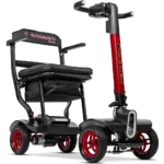 Forcemech Traveler Lightweight Folding Mobility Scooter in red shown from an angled front view with a padded seat and sturdy wheels.